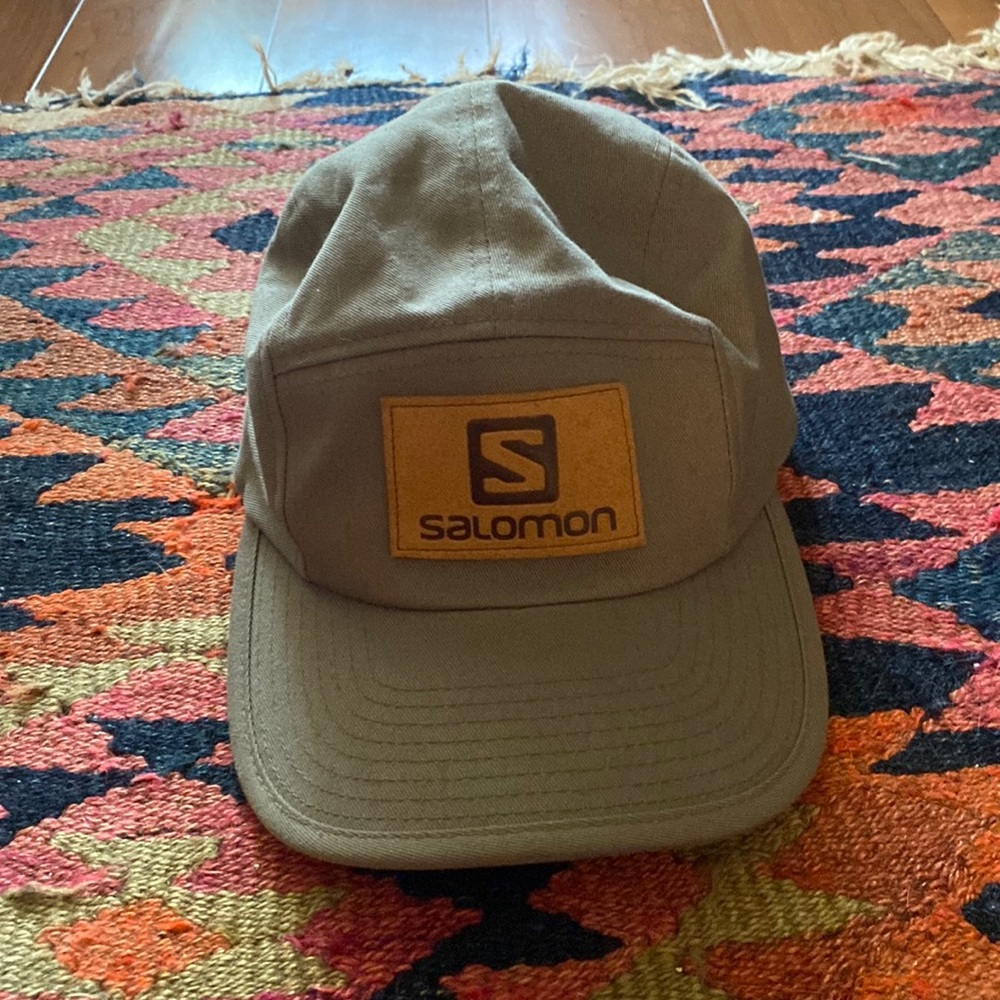 Salomon five panel hat.  Grey/beige color.  One size.